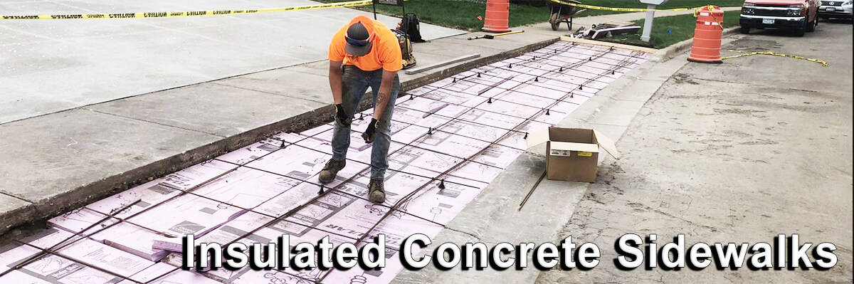 Goodmanson Construction putting in rebar and polystyrene foam for an insulated concrete sidewalk.
